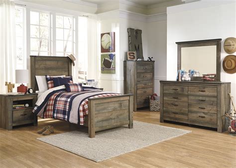 Signature Design By Ashley® Trinell 4 Piece Rustic Brown Twin Bedroom