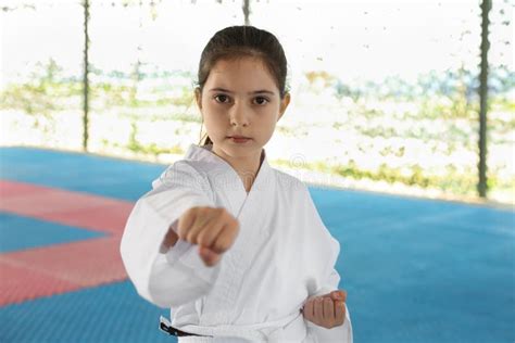 girl in kimono practicing karate on tatami outdoors stock image image of girl background