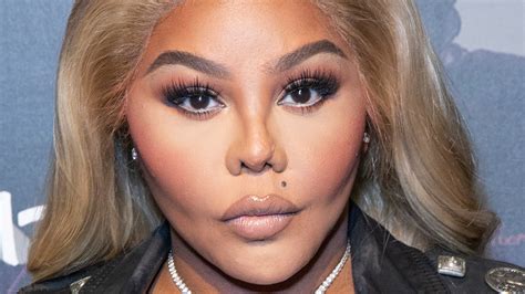 What Lil Kim Really Looks Like Underneath All That Makeup