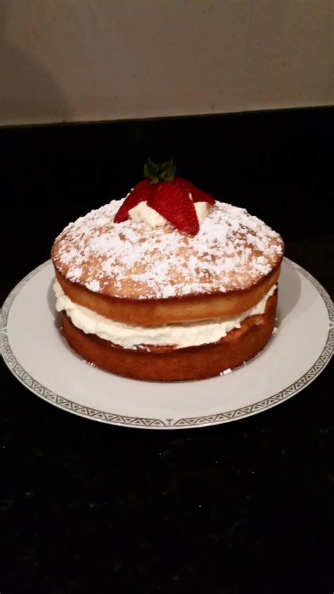 Homemade Victoria Sponge Cake With Strawberry Jam Fresh Strawberries And Fresh Cream Filling