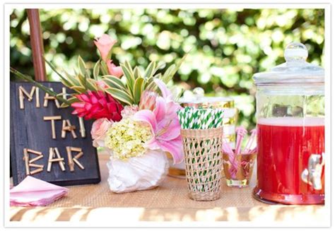 Bridal party ideas during covid. Tiki bridal shower bar- love the tropical flowers in the ...
