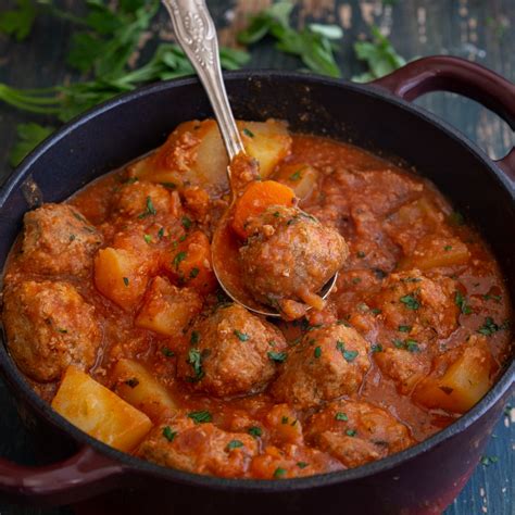 Heat the oil in a large pan, add the meatballs and cook for 5 mins, until golden brown all over. Hearty Italian Meatball Stew - An Italian in my Kitchen