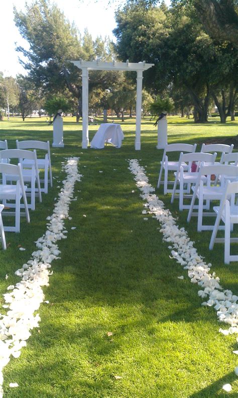 White Rose Petals Down The Aisle Awaiting The Bride Wedding Petals
