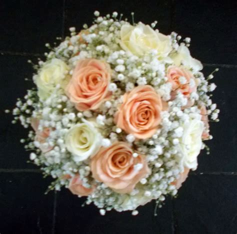 Handtied Bouquet Of Roses And Gypsophila In Peach And White Tones