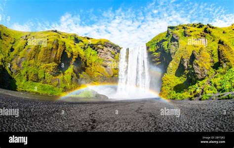 Skogafoss One Of The Most Beautiful Waterfalls On Sunny Day With