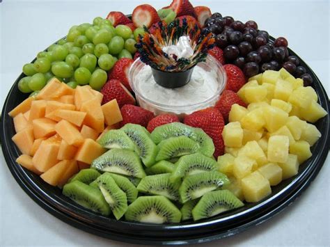 Easy Fruit Tray Idea With Melon Pineapple Grapes Strawberries And