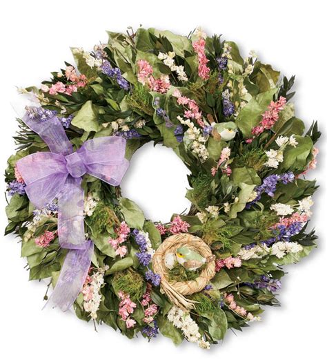 We haven't used our door for weeks trying to keep her safe. Bird's Nest Wreath | Wind and Weather