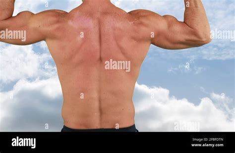 Bodybuilder Flexing His Back Muscles Stock Video Footage Alamy