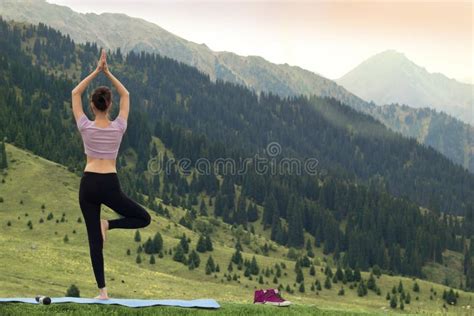 Yoga Woman Doing Tree Pose Meditation And Balance Exercise In