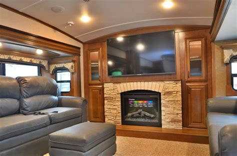 The interior offers features such as a residential serta mattress with. 2016 jayco pinnacle front living room | Luxury rv, Living ...