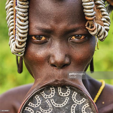 Portrait Of Woman From Mursi Tribe Ethiopia Africa Stock