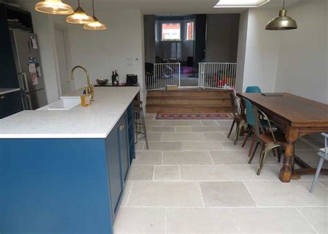 Tile is a great option in the kitchen. Limestone is proving more and more popular for a stone kitchen floor