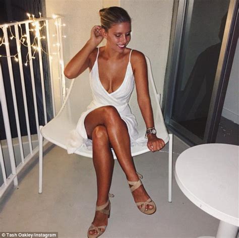 Natasha Oakley Flaunts Her Deep Tan And Ample Cleavage In Instagram