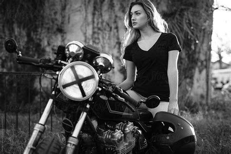 Attractive Girl Motorcycle Rider Posing Del Colaborador De Stocksy