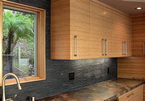 Kitchen cabinets with light bamboo. light bamboo cabinets & dark grey countertops and ...