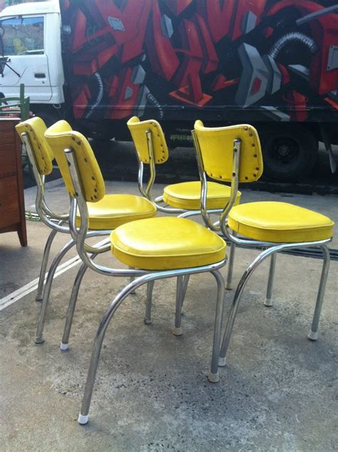 They feature chrome finish with fabric and vinyl covering. Yellow retro chairs will be first on my list for Joe ...