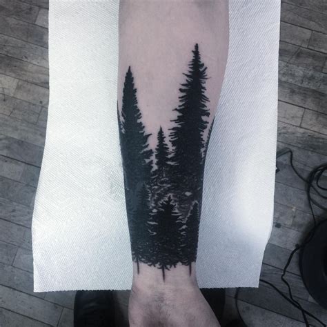 Forest Silhouette Tattoo On The Left Inner Forearm And Wrist