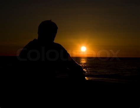 The Lonely Man Looks Beautiful Sunset Stock Image Colourbox