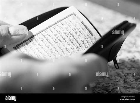 Muslim Man Is Reading The Koran Stock Photo Alamy