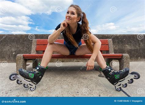 Smiling Girl With Roller Skates Outdoor Stock Photo Image Of Denim