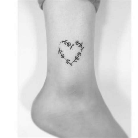 Made by robson carvalho tattoo artists in sao paulo, brazil very nice 3 colors tattoo artwork of flowers heart motive done by tattoo artist zihee tattoo | post 20 mesmerizing and unique heart tattoos to express yourself. 20 Gorgeous Flower Tattoo Designs for Female | Styles Weekly