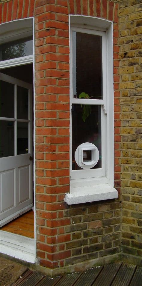 When your cat flap window insert arrives, simply place one edge into the window track. DIY Fitting of Cat Flaps and Dog Doors - Four Paws Doors