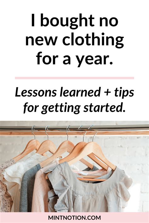 clothes on hangers with text that reads i bought no new clothing for a year lessons learned