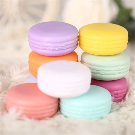 Because the ingredients are relatively inexpensive and it's simple to make in your own. Candy Color Macarons empty cosmetic containers plastic lip balm container sub bottling DIY lip ...