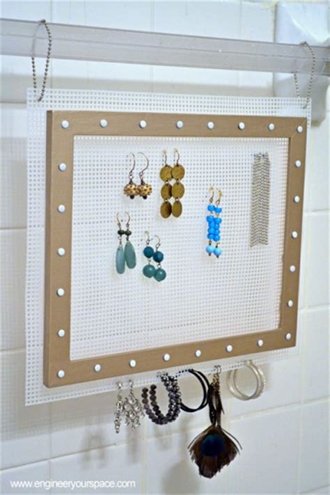 Has 38 hooks and can hold over 300 pieces of jewelry. DIY Hanging Earring Jewelry Organizer | Smart DIY ...