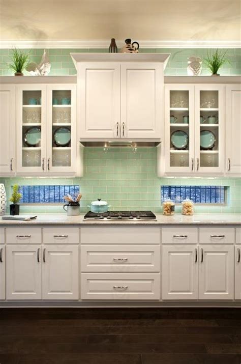 18+ breathtaking white kitchen remodel barn doors ideas. Beautiful green walls,white kitchen cabinets, Glass front ...