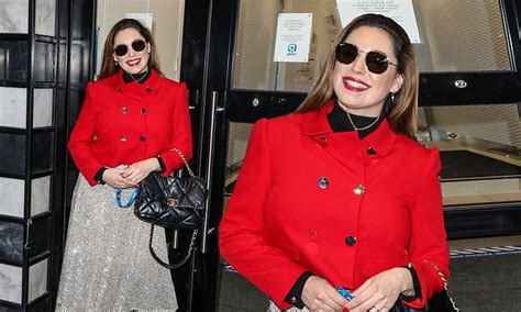 Kelly Brook Puts On A Festive Display In A Bright Red Jacket And
