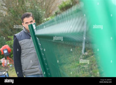 Installing Garden Fence Hi Res Stock Photography And Images Alamy