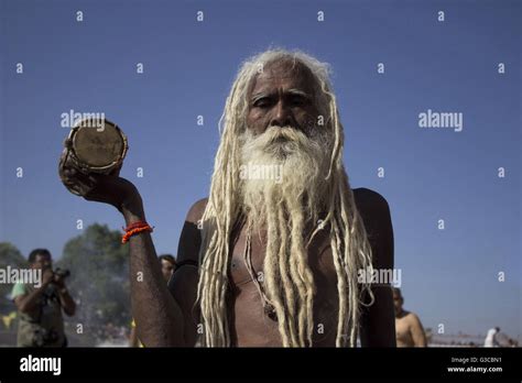 Naga Sadhu Playing Damaru Or Drum Kumbh Mela Ujjain Madhya Pradesh India Stock Photo