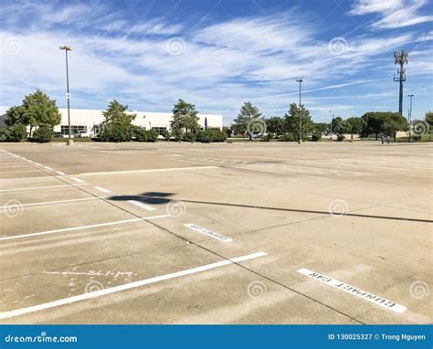 Huge Empty Urban Parking Lot On Cloud Blue Sky In Texas Usa Stock