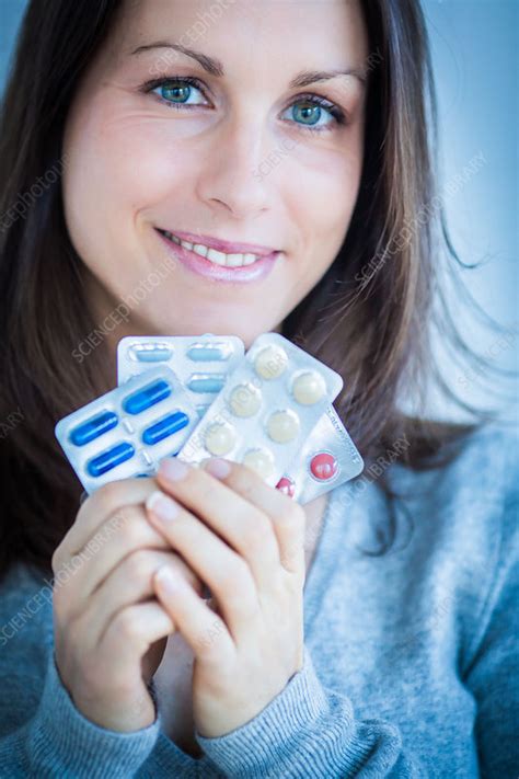 Woman Taking Medicine Stock Image C034 0116 Science Photo Library