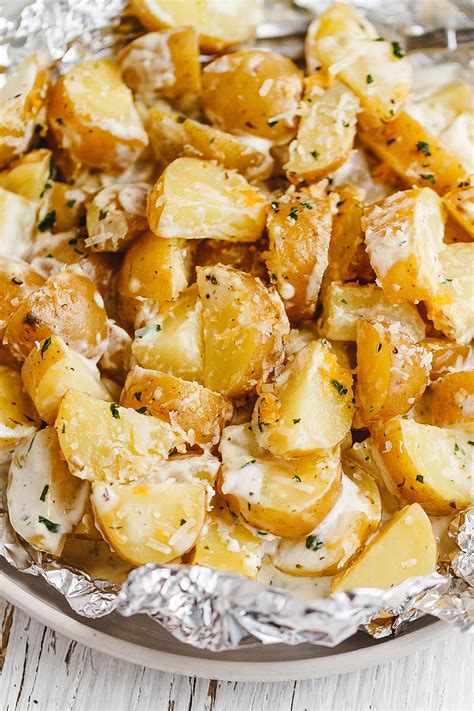 Baking a potato wrapped in foil is very popular, especially at those campouts over a fire, or on the grill. Parmesan Ranch Potatoes in Foil Packets Recipe — Eatwell101