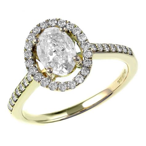 5 out of 5 stars. 18ct yellow gold 1.01ct E SI1 EGL oval diamond halo ring. - Engagement from Mr Harold and Son UK