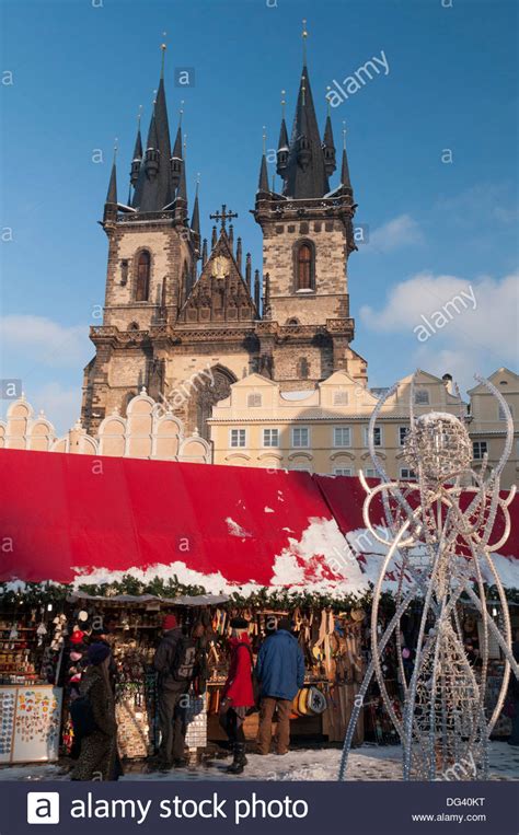 Snow Covered Christmas Market And Tyn Church Old Town Square Prague Czech Republic Europe