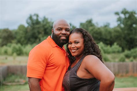 portrait of happy couple by stocksy contributor leah flores stocksy