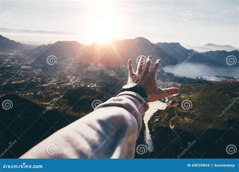 Hand Of A Man Reaching Out The Beautiful Landscape Stock Photo Image