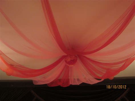 Tulle decorations, party decoration ideas and. Red and pink flower ball and tulle for ceiling decoration ...