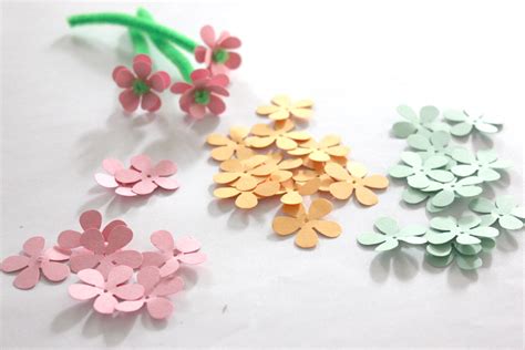 Tissue paper flowers are a great keepsake and classroom, mother's day, spring or summer craft for kids. Paper and Pipe Cleaner Flowers - Repeat Crafter Me