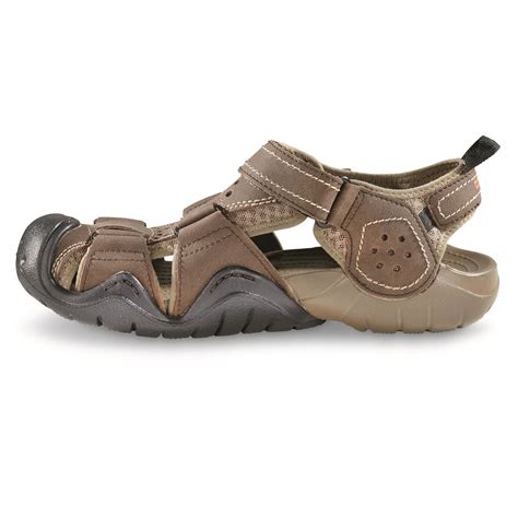 Most of our sandals are made from croslite™ foam, so you'll never have to sacrifice comfort or support with a stylish pair. Crocs Men's Swiftwater Leather 2.0 Fisherman Sandals ...