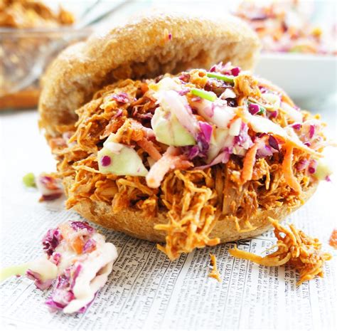 Add any of your favorite sandwich toppings to go along with the bbq shredded chicken sandwich. Haute & Healthy Living Pulled Crockpot BBQ Chicken Sandwiches | Haute & Healthy Living