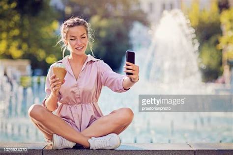 Girl Flashing Camera Photos And Premium High Res Pictures Getty Images
