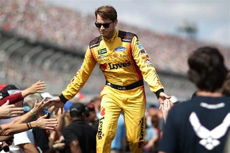 Landon Cassill Returns To Cup Series To Drive Two Races For Starcom Racing The Checkered Flag