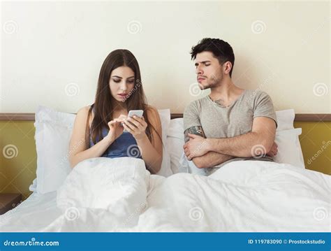 Jealous Husband Watching His Wife Using Mobile Phone Royalty Free Stock Image Cartoondealer