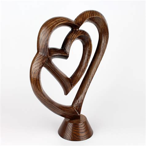 Apart from birthday gifts for women online, we also have a wide range of romantic gifts for girlfriend or anniversary gift for wife as well as fashion accessories and other gifting items available for you to choose from. Wooden Entwined Hearts Sculpture Romantic Anniversary gift ...