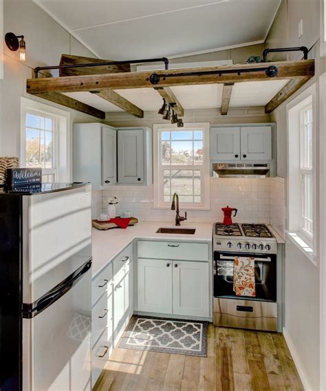 Featured on hgtv's tiny house, big living, it has plenty of windows, food storage, shelves for herbs, a full size fridge, farmhouse sink, and lots of natural light. Huckleberry by Mouse House Tiny Homes | Tiny house kitchen ...