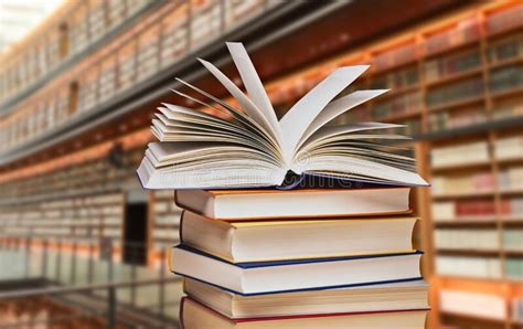 Book Piles In Front Of Library Shelves Stock Photo Image Of